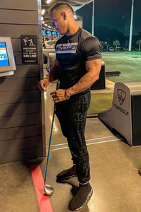 men wearing 5 star club shirt and holding golf stick